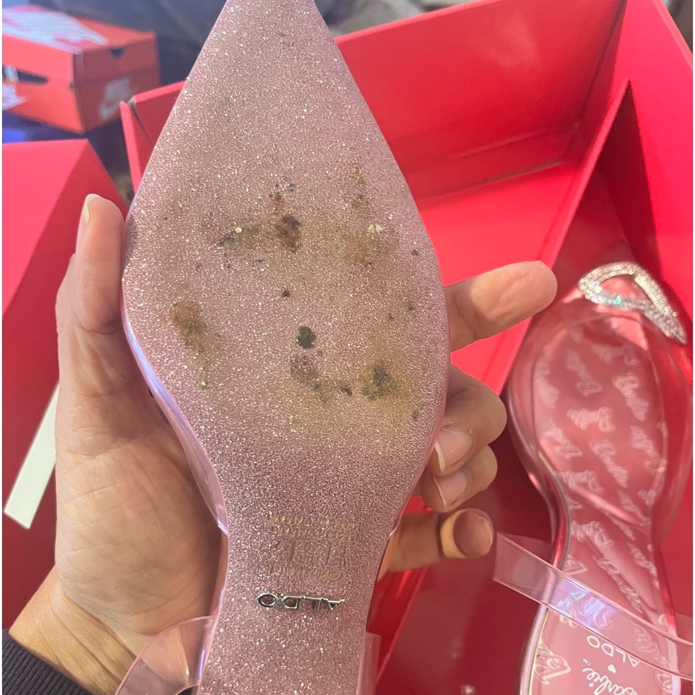 Barbie size 9 shoes . used wore them once so bottom is dirty
